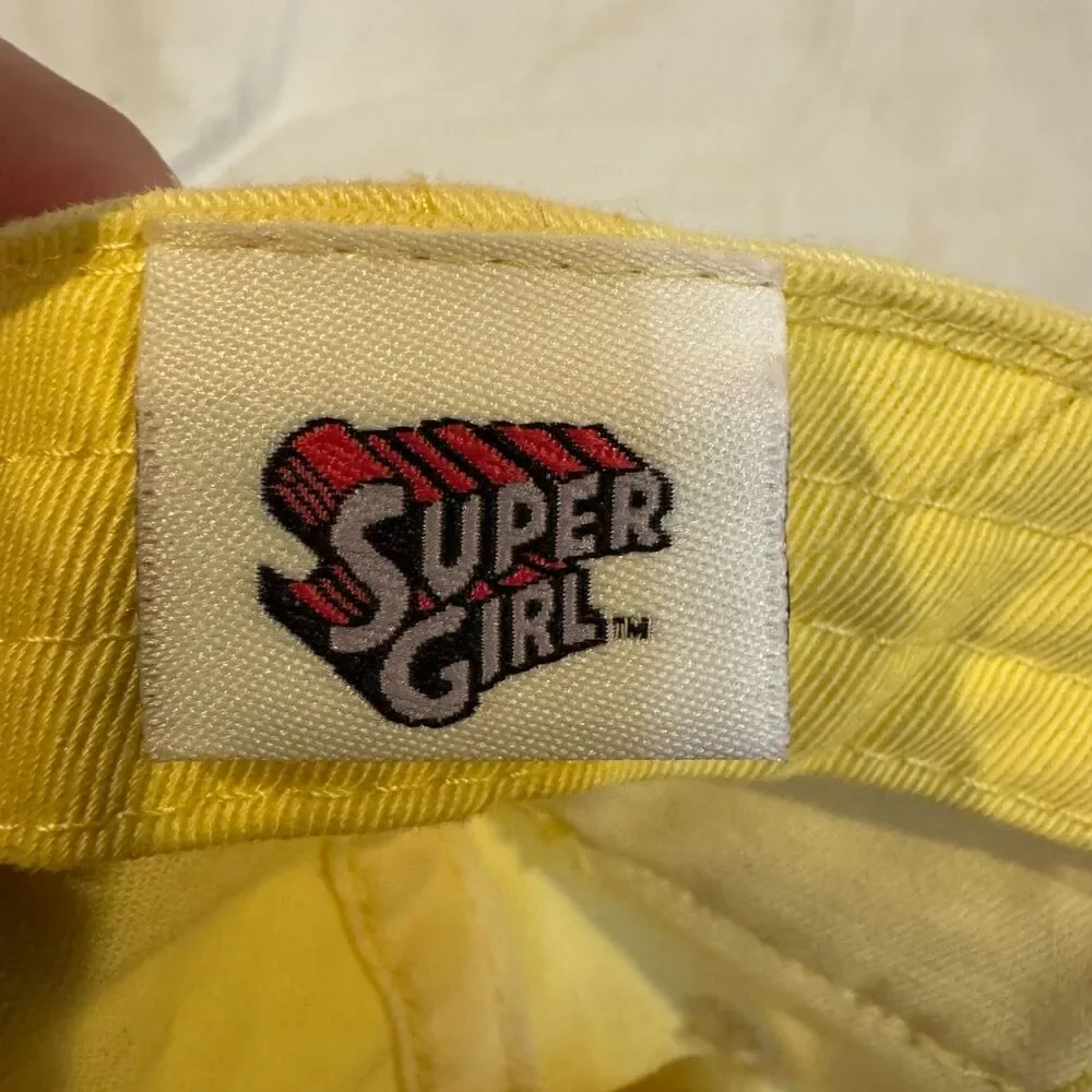 DC Comics Supergirl Hat Yellow Cargo Pocket Anoma Shield Cap AS IS FLAWED Stain